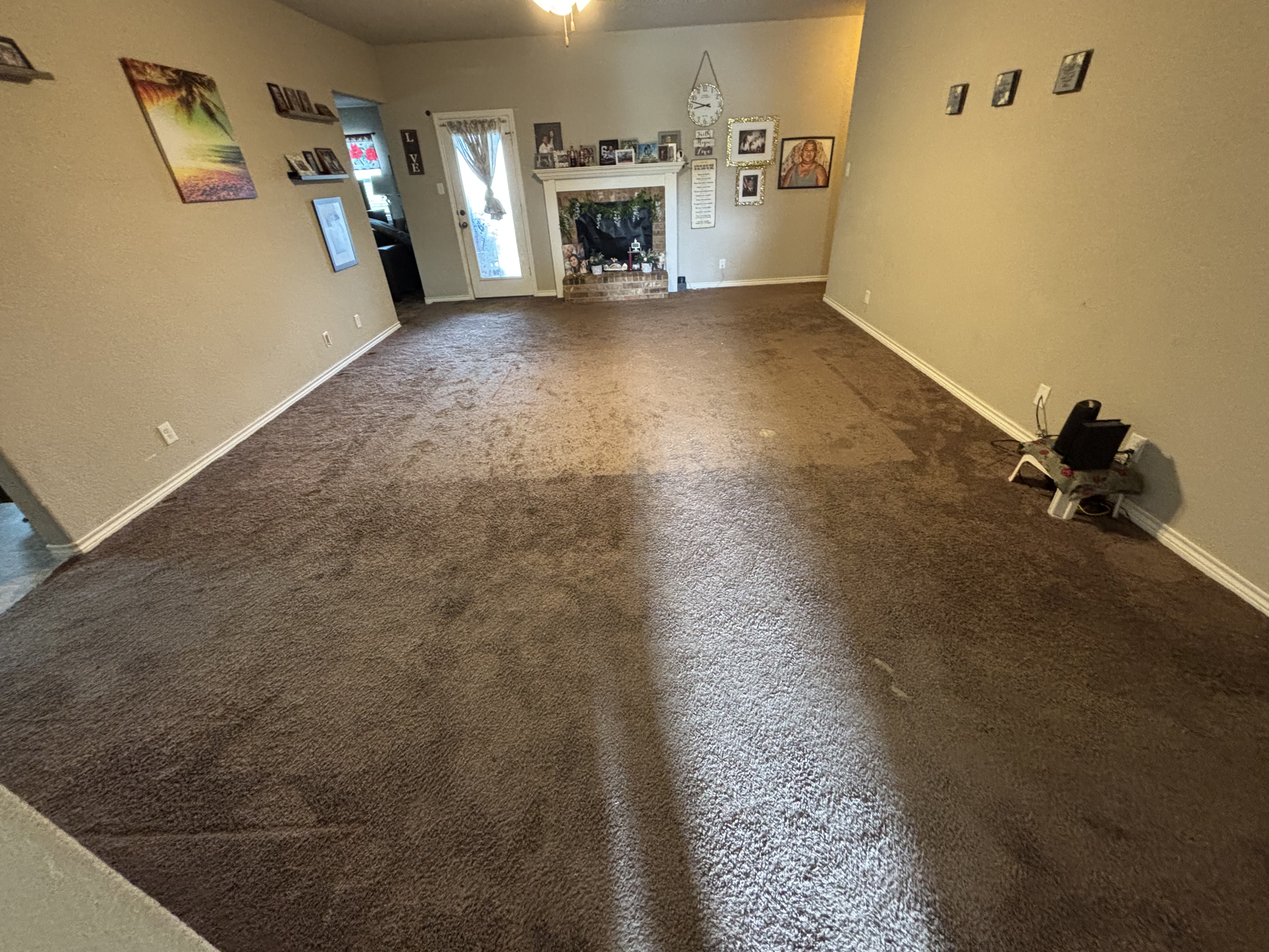 Out with the old carpet, in with beautiful new hardwood floors.